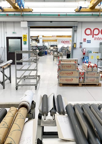 Anilox rolls awaiting final QC inspection and careful packing prior to shipment at Apex Italy's expanded facility.